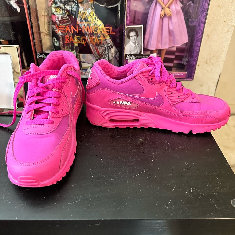 Nike Air Max is hot pink/fushia, these are well kept only worn once.